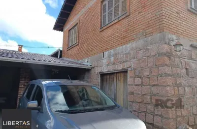Casa com 3 quartos à venda na Estrada João Passuelo, 1100, Vila Nova, Porto Alegre