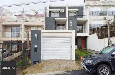 Casa com 3 quartos à venda na Rua Heitor Kramer, 680, Guarujá, Porto Alegre