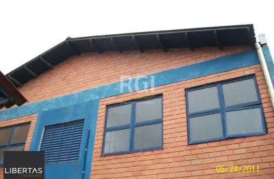 Prédio à venda na Rua Doutor Mário Totta, 2396, Camaquã, Porto Alegre