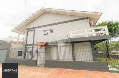 Casa para venda - 238.35m², 4 dormitórios, sendo 1 suites, 2 vagas - nonoai