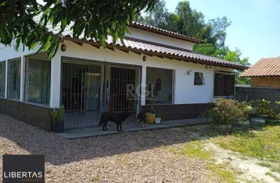 Casa para venda - 72m², 2 dormitórios, sendo 2 suites, lageado