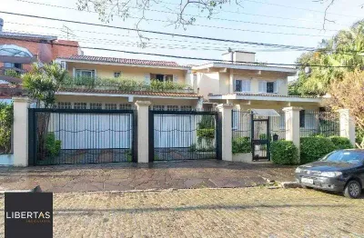 Casa para venda - 420m², 5 dormitórios, sendo 2 suites, 6 vagas - nonoai