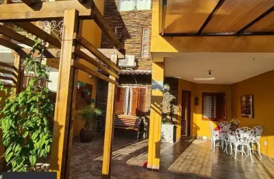 Casa com 4 quartos à venda na Rua Baldoino Bottini, 392, Hípica, Porto Alegre