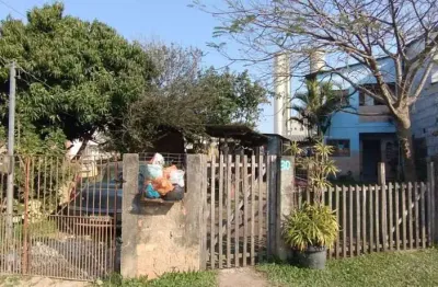 Casa com 5 quartos à venda na Rua Sete Mil e Quatro, 30, Restinga, Porto Alegre