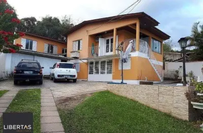 Casa com 4 quartos à venda na Rua José Alves de Castro, 468, Vila Nova, Porto Alegre