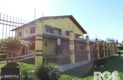 Casa com 4 quartos à venda na Rua Maria Elaine Wotter, 160, Parque Santa Fé, Porto Alegre