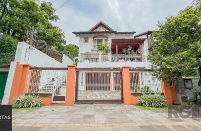 Casa com 4 quartos à venda na Avenida General Barreto Viana, 595, Chácara das Pedras, Porto Alegre