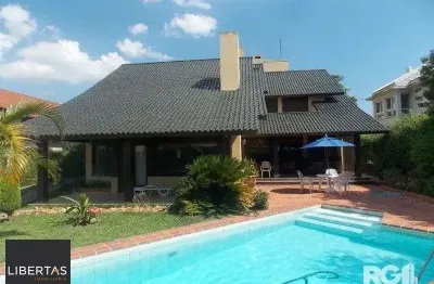 Casa em condomínio fechado com 4 quartos à venda na Avenida da Cavalhada, 5205, Cavalhada, Porto Alegre