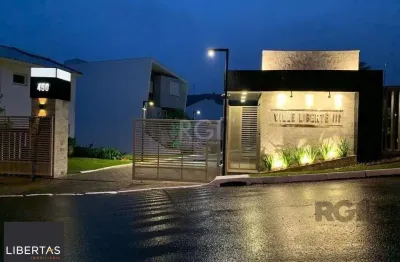 Terreno em condomínio fechado à venda na Rua Adriano Pereira da Silva, 450, Vila Nova, Porto Alegre