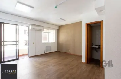 Excelente sala comercial, muito bem localizada no bairro menino deus, 01 banheiro, sacada e ar condicionado split, toda montada