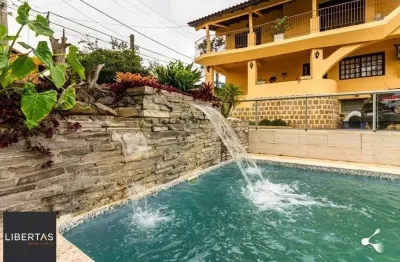 Casa com 4 quartos à venda na rua moacir bastiani, 334, campo novo, porto alegre, 319 m2 por r$ 1.850.000