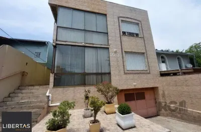 Apto 02 dormitórios amplas peças - 01 vaga escriturada no bairro tristeza