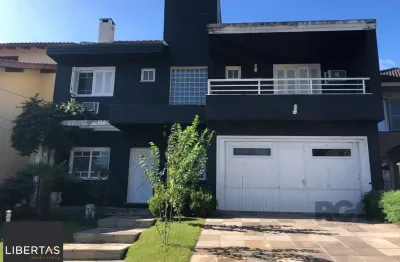 Casa em condomínio fechado com 4 quartos à venda na Rua Tocantins, 937, Lomba do Pinheiro, Porto Alegre