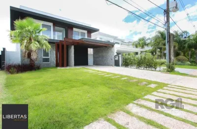 Casa em condomínio fechado com 4 quartos à venda na Avenida Juca Batista, 9000, Belém Novo, Porto Alegre