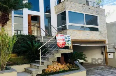 Casa em condomínio fechado com 3 quartos à venda na Rua Tocantins, 540, Lomba do Pinheiro, Porto Alegre