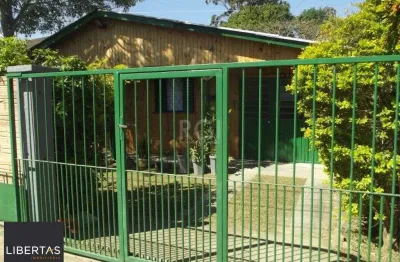 Casa com 3 quartos à venda na Rua Paulo Rubilar de Farias, 65, Restinga, Porto Alegre