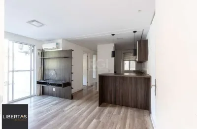 Apartamento 2 dormitórios , sala com dois ambientes , cozinha americana sacada com churrasqueira 1 vaga