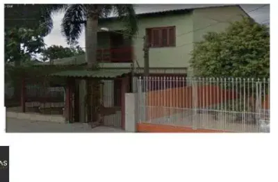 Casa com 3 quartos à venda na Rua Taimbé, 143, Sumaré, Alvorada