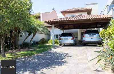 Casa em condomínio fechado com 3 quartos à venda na Avenida Juca Batista, Belém Novo, Porto Alegre