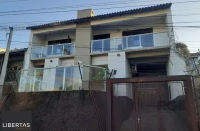 Casa com 3 quartos à venda na Rua Eurico Lara, 505, Medianeira, Porto Alegre
