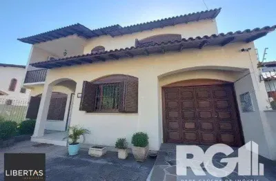 Casa com 4 quartos à venda na Rua Paulo Blaschke, 645, Jardim Itu Sabará, Porto Alegre