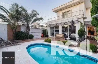 Casa com 3 quartos à venda na Rua Irmão Adão Rui, 544, Marechal Rondon, Canoas