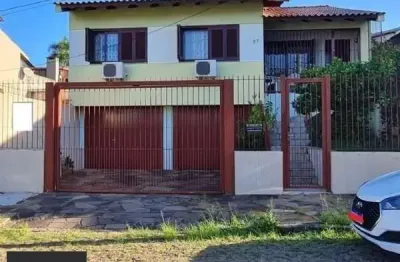 Casa com 4 quartos à venda na Rua Damasceno Vieira, 97, Partenon, Porto Alegre