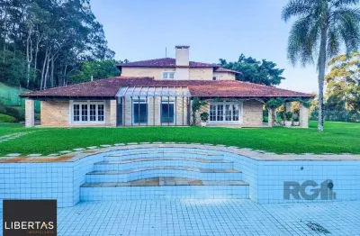 Casa em condomínio fechado com 5 quartos à venda na Estrada das Três Meninas, 1402, Vila Nova, Porto Alegre