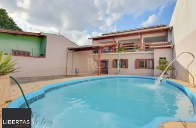 Ótima casa com 5 dormitórios no bairro rio branco em canoas