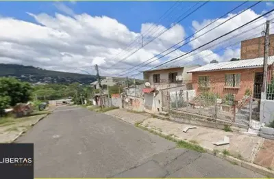 Terreno à venda na Rua Helena Pettenuzzi Santiago, 45, Teresópolis, Porto Alegre