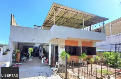 Casa com 5 quartos à venda na Avenida Vicente Monteggia, 2231, Cavalhada, Porto Alegre