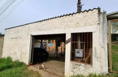 Casa com 4 quartos à venda na Rua Dinamarca, 205, Lomba do Pinheiro, Porto Alegre