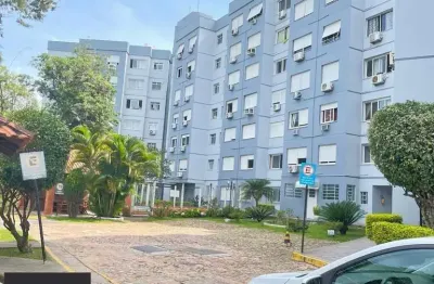 Apartamento dois dormitórios térreo com uma vaga escriturada