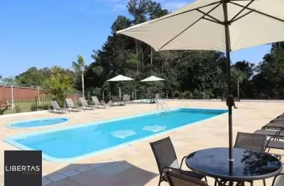 Casa de condomínio com 2 quartos e 2 vagas à venda, 66m² - formoza