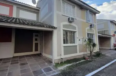 Casa em condomínio com 3 dormitórios, banheira, churrasqueira e 2 vagas