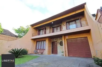Casa com 3 quartos à venda na Avenida João Wallig, 119, Passo da Areia, Porto Alegre