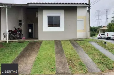 Casa em condomínio com 2 dormitórios, suíte e 2 vagas, infraestrutura completa.
