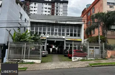 Prédio comercial a venda com pé direito duplo e estacionamento, bairro cristo redentor, porto alegre, rs
