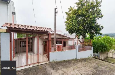 Casa com 3 quartos à venda na Rua Cunha Neto, 334, Nonoai, Porto Alegre