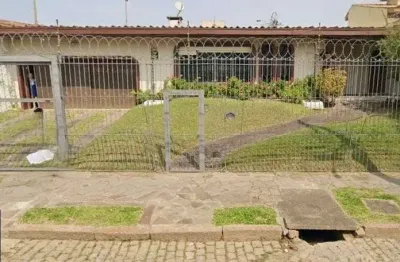 Casa com 4 quartos à venda na Rua Jacipuia, 201, Guarujá, Porto Alegre