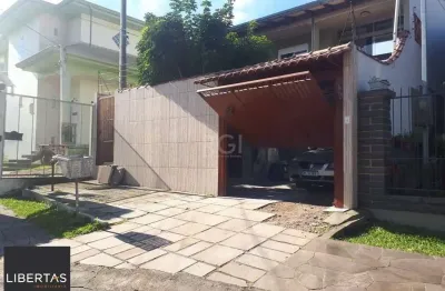 Casa com 3 quartos à venda na Rua José Pereira da Cunha, 49, Vila Nova, Porto Alegre