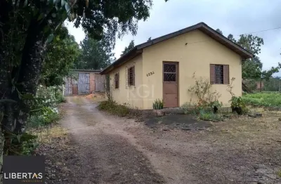 Casa com 2 quartos à venda na Avenida Edgar Pires de Castro, 6234, Hípica, Porto Alegre