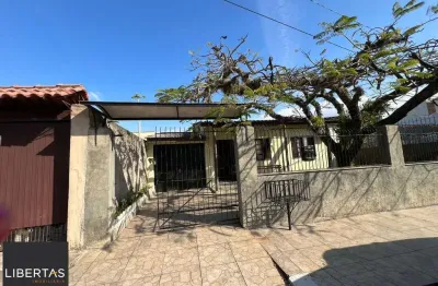 Casa com 3 quartos à venda na Rua Criciúma, 273, Guarujá, Porto Alegre