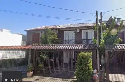 Casa com 2 quartos à venda na Rua Zuzu Angel, 248, Hípica, Porto Alegre