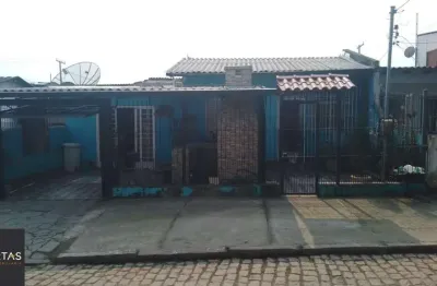 Casa com 3 quartos à venda na Acesso G, 621, Restinga, Porto Alegre