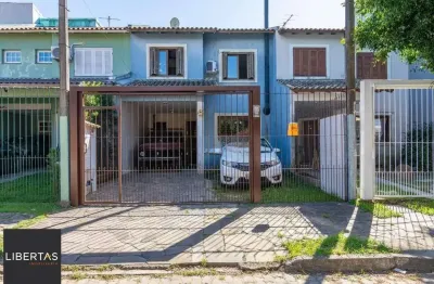 Casa com 3 quartos à venda na Rua Rodolpho Espinoza, 47, Hípica, Porto Alegre