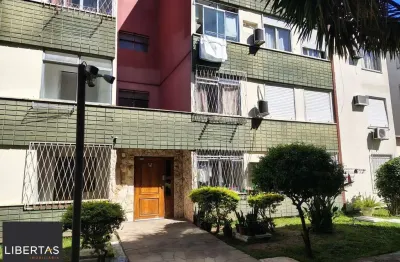 Apartamento de 2 dormitórios, living, cozinha, área de serviço e banheiro social.