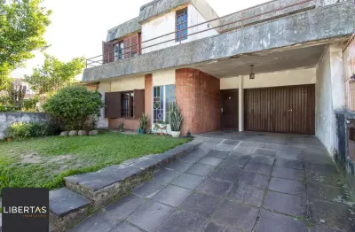 Casa com 4 quartos à venda na Rua Tupã, 88, Vila Assunção, Porto Alegre
