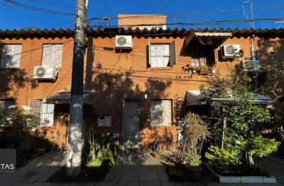 Casa em condomínio fechado com 3 quartos à venda na Rua Mura, 356, Guarujá, Porto Alegre