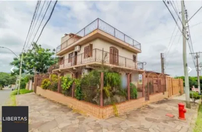 Casa com 3 quartos à venda na Rua José Knijnik, 145, Vila Nova, Porto Alegre